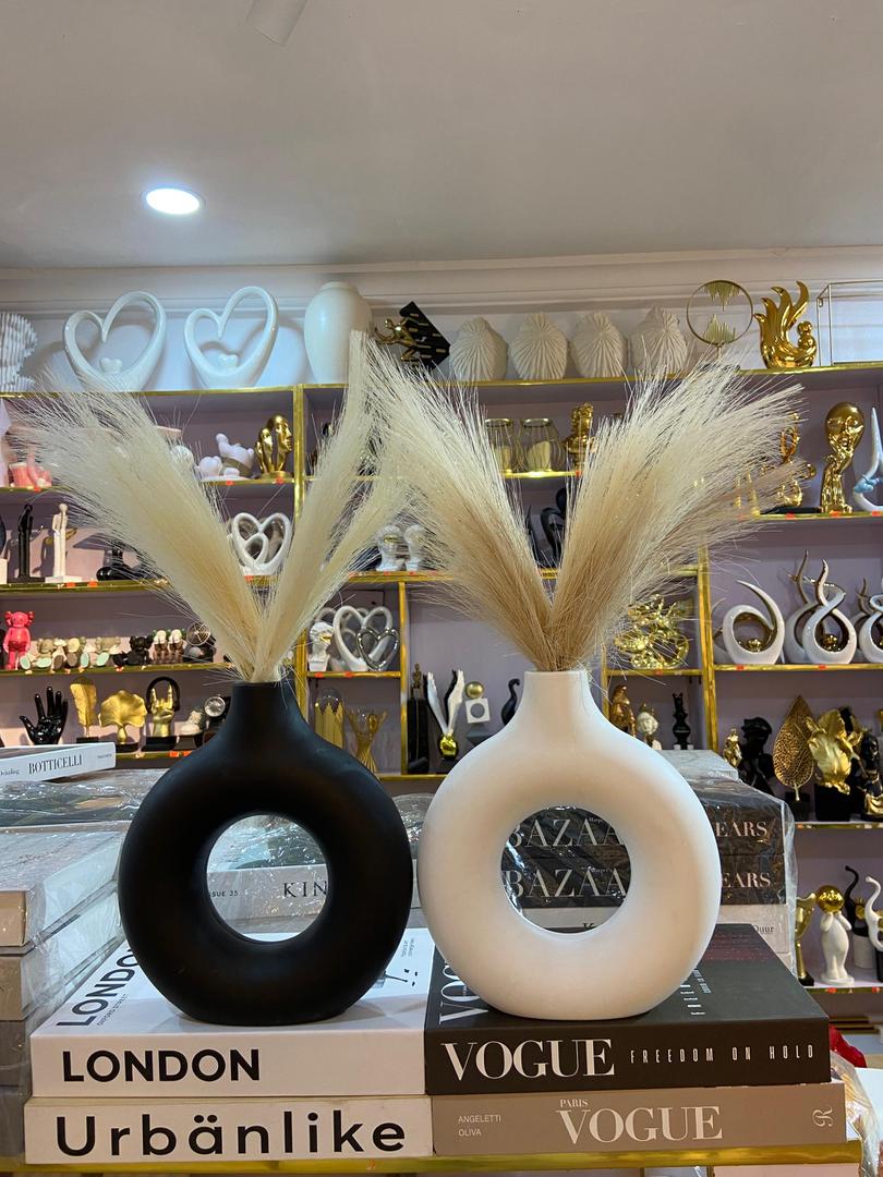 Black and white donut vases with pampas grass